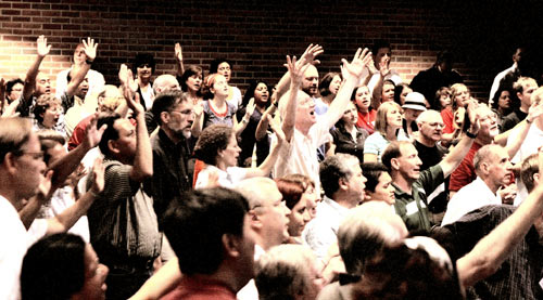 hands raised in worship