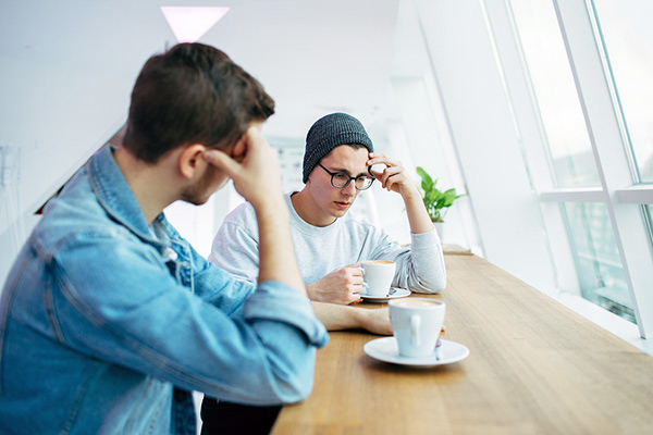 two guys
                                                          having coffee
                                                          and talking